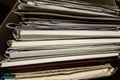 Paper documents stacked in archive. Old folders with documents in the box. office files background texture, closeup Royalty Free Stock Photo