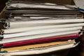 Paper documents stacked in archive. Old folders with documents in the box. office files background texture, closeup Royalty Free Stock Photo