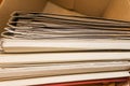 Paper documents stacked in archive. Old folders with documents in the box. office files background texture, closeup Royalty Free Stock Photo