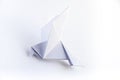 Paper dove origami isolated on a white background