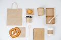 Paper eco friendly items in composition. Carton compostable products over white