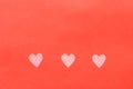 Paper elements in shape of heart flying on pink background. Royalty Free Stock Photo