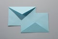 Paper envelopes on grey background, top view. Mockup for design Royalty Free Stock Photo