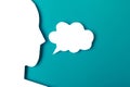 Paper face and speech bubble on colorbackground copy space for text, communication, symbolic- Image Royalty Free Stock Photo