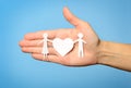 Paper family in hand Royalty Free Stock Photo