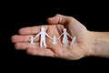 Paper family in hand Royalty Free Stock Photo