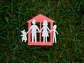 Paper family and house. eco friendly concept, save the earth with happy family Royalty Free Stock Photo