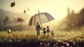 Paper Family Under Umbrella on Dewy Morning Grass Royalty Free Stock Photo