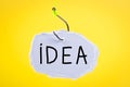 Paper on fishing hook with word idea. Royalty Free Stock Photo
