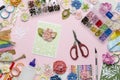 Paper flowers, scissors, homemade card, paper and scrapbooking items on pink background Royalty Free Stock Photo