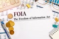 Paper with The Freedom of Information Act FOIA on a table Royalty Free Stock Photo
