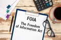 Paper with The Freedom Of Information Act FOIA on a table Royalty Free Stock Photo