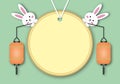 Paper full moon with cute rabbits on pastel green background, Concept for mid autumn festival and greeting card .