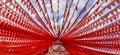 Paper garlands used to make a peculiar formation on the top of a temple during devotional festival ceremony