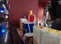 Paper glass Pepsi and caramel and cheese popcorn in the cinema near the cafe cash register on February 6, 2020 in Russia,