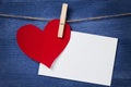 Paper heart and card hanging on a rope Royalty Free Stock Photo