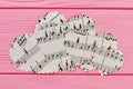 Paper heart shaped figurines with music notes. Royalty Free Stock Photo