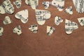 Paper hearts with music notes on craft paper