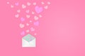 Paper Hearts out of the envelope with copy space pastel color on pink background. Symbols of love for Happy Women`s, Mother`s, Royalty Free Stock Photo