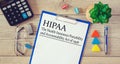 Paper with HIPAA The Health Insurance Portability and Accountability Act of 1996 on the table Royalty Free Stock Photo