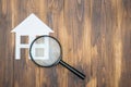 Paper house with Magnifying Glass, House hunting