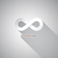 Paper infinity symbol on grey background