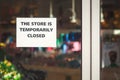 Paper with information about temporary closure of the store. Royalty Free Stock Photo