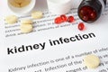 Paper with kidney infection and pills. Royalty Free Stock Photo