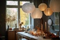 paper lanterns, made from paper and string, hanging above dining table