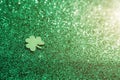 A paper leaf of clover on a shiny green background. Background for St. Patrick`s day. Royalty Free Stock Photo