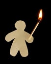 Paper man with burning wooden match Royalty Free Stock Photo