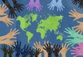 Paper multi-colored hands reach for the continents of the earth, the concept of maintaining peace on the planet