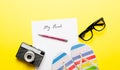 Paper My Book, pen, glasses, camera and sandals Royalty Free Stock Photo