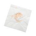 Paper napkin with coffee stain on white background