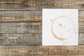 Paper Napkin with a coffee stain on white Royalty Free Stock Photo