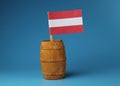 A paper national flag of Austria on wooden stick in wooden barrel