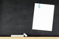 paper note on black board. blank notes. sticker note empty space for add text Royalty Free Stock Photo