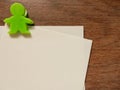 Paper note with green clip