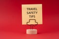 Paper note with text travel safety tips