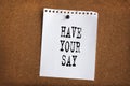 Paper note written with HAVE YOUR SAY inscription on cork board Royalty Free Stock Photo