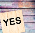 Paper note with YES written on paper. Lifestyle concept Royalty Free Stock Photo