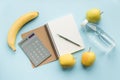 Paper notebook with calculator and pen Royalty Free Stock Photo