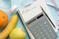 Paper notebook with calculator and pen Royalty Free Stock Photo