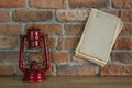 Paper and old kerosene lantern Royalty Free Stock Photo