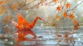 A paper origami bird floating in water with orange leaves, AI Royalty Free Stock Photo