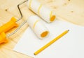 Paper with pencil and platen for paint on wooden Royalty Free Stock Photo