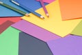 paper and pencils for artwork, color palette of paper, multicoloured paper background, multicolour paper and coloured pencils