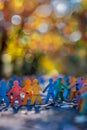 Paper people of all colors holding hands together Royalty Free Stock Photo