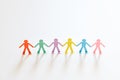 Paper people chain concept of social help and togetherness in group Royalty Free Stock Photo