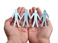 Paper people in hands Royalty Free Stock Photo